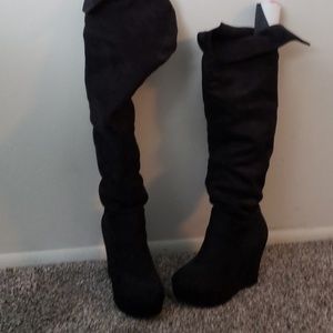 Knee high black boots